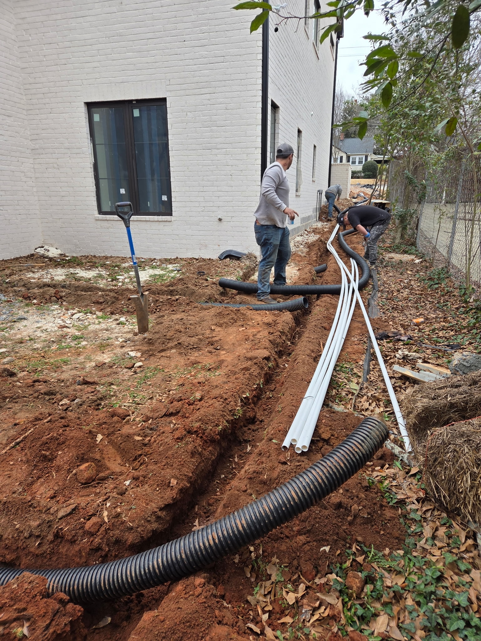 French drain and pipe installation for residential drainage solution